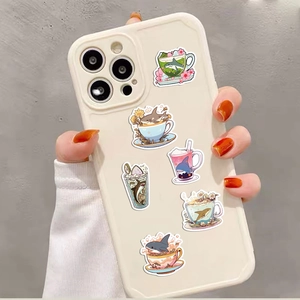Cute cartoon shark stickers on a cream white smartphone case held by a person