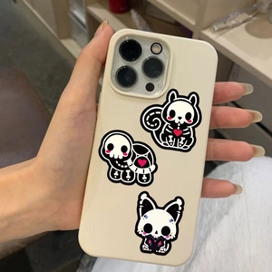 Macro detail of waterproof skull animal stickers on a mobile phone case for decoration