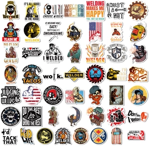 Macro view of assorted waterproof welder stickers with cartoon designs and slogans