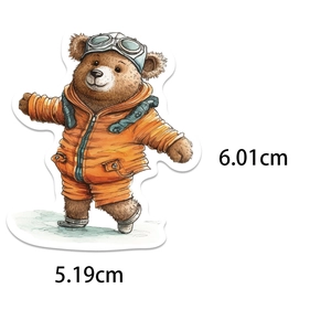 Detailed view of an anthropomorphic brown bear sticker in orange flight suit with size markings