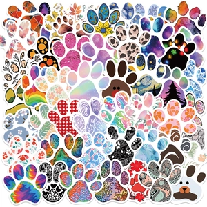 Close-up of assorted waterproof paw print stickers with floral and artistic patterns