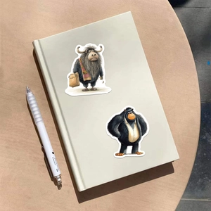 Anthropomorphic animal stickers featuring a yak traveler and chimpanzee on a notebook cover