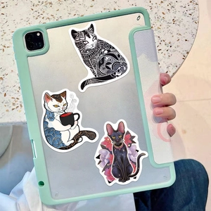 Close-up of cute cartoon cat stickers on a green iPad case for creative decoration