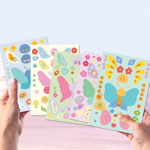 Five sheets of colorful butterfly make-a-face stickers for DIY children craft and play