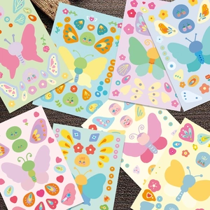 DIY colorful butterfly make-a-face stickers set for kids featuring cute emoji expressions