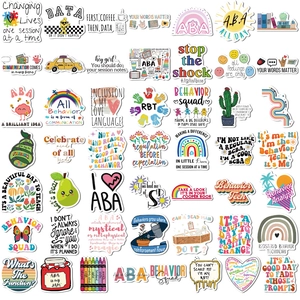 Detailed flat lay of 50 waterproof ABA therapy stickers for laptops and journals