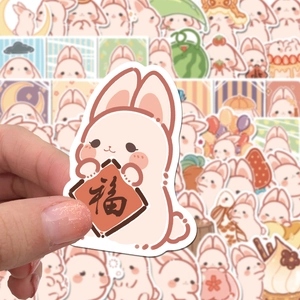 Close-up of cute cartoon rabbit sticker with Fu character for notebooks and planners