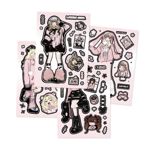 Detail of pink and black DIY stickers with cartoon girls and music theme for scrapbooking