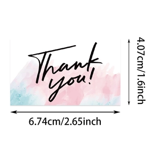 Vista dettagliata dell'etichetta di ringraziamento acquerello con dimensioni 4,07x6,74 cm