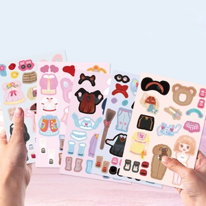 Detailed view of 5 colorful cartoon girl dress-up sticker sheets for DIY decor