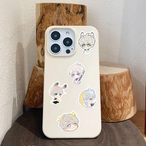 Detailed view of cream iPhone case featuring five cute chibi anime character illustrations