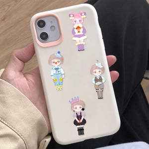 Detail of cute cartoon girl stickers on a cream iPhone case with pink camera protector