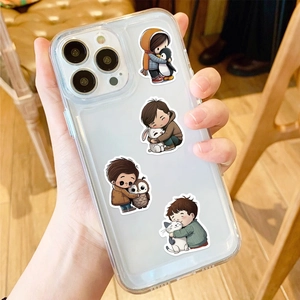 IPhone clear case with 50 healing cartoon stickers featuring kids hugging cute animals