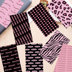 Pink and black decorative scrapbooking paper set with heart and animal print designs