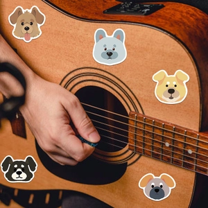 Creative cartoon puppy stickers set displayed on a guitar for DIY decoration