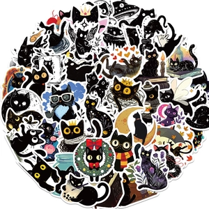 Flat lay of 50 waterproof cartoon black cat stickers for DIY laptop and luggage decor