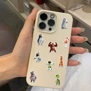 DIY 3D animal cartoon stickers applied on an off-white phone case in a real-life setting