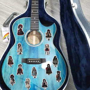 Gothic vampire girl stickers on a blue guitar showcasing waterproof PVC material and design