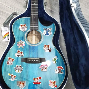 Cute cartoon girl stickers applied on a blue guitar with various poses and expressions