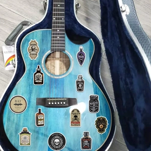 Waterproof vintage dark potion stickers applied on guitar showing decorative gothic textures