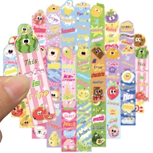 Detailed view of colorful cartoon food bookmarks featuring cute personified fruit designs