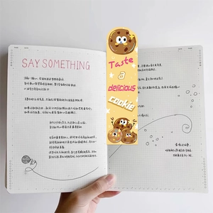 Cute cartoon cookie bookmark for books featuring a vibrant yellow food theme design