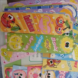 Detailed view of creative cartoon food bookmarks featuring colorful cherry and durian designs