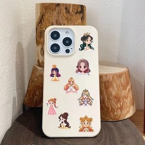 Close-up of cream iPhone case with cartoon princess stickers on a wooden stand