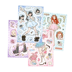 Close-up of DIY KPOP girl group themed stickers featuring diverse fashion outfits and icons