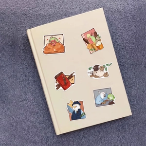 Waterproof cartoon bird stickers on a yellow notebook featuring 6 unique comic designs