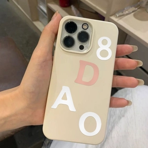 Creamy yellow iPhone silicone case with large 3D artistic 8DAO alphabet decorations