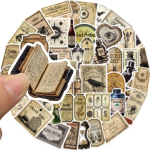 Detailed close-up of vintage gothic apothecary stickers showing printed potion bottle designs