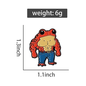 Detail showing dimensions of red muscular frog enamel pin measuring 1.3 by 1.1 inches