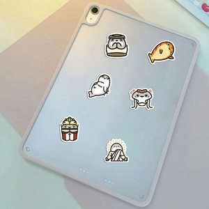 Close-up of cute cartoon fish stickers on a purple tablet case with high-quality PVC finish