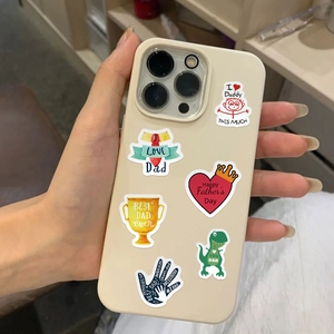 Detail showing waterproof DIY Father's Day stickers with colorful patterns on a phone case