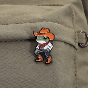 Cute cartoon cowboy frog enamel pin badge for backpacks and clothing accessories