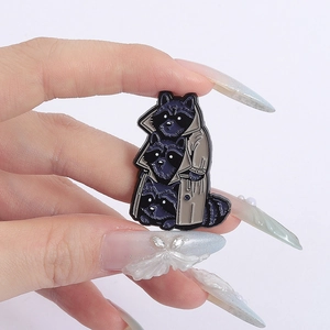Creative alloy enamel brooch featuring three cute raccoons in a gray trench coat decoration