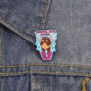 Funny cartoon frog enamel pin on denim jacket with slogan Bestie He is Gross