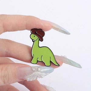 Broche en émail dinosaure vert avec chapeau de cow-boy pour décor de sac à dos