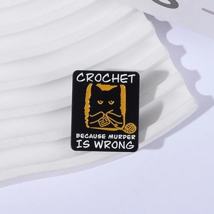 Funny black cat crochet enamel pin with text Crochet Because Murder Is Wrong