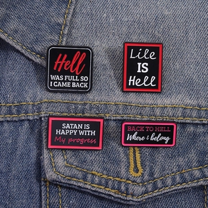 Gothic style enamel letter pin set on denim jacket with dark humor theme slogans