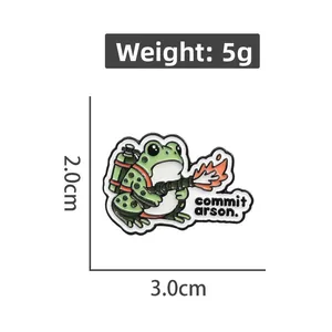 Detailed view of cartoon frog enamel pin with arson theme showing 3.0cm width and 5g weight