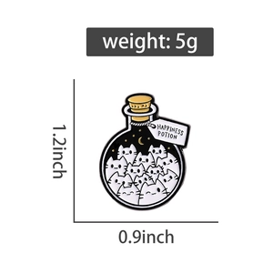 Detail view of happiness potion enamel pin featuring white cats with size and weight info