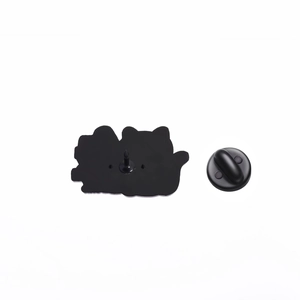 Detailed back view of enamel pin with rubber clutch and anti-slip positioning pins