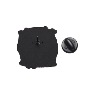 Detail view of the black matte enamel pin back and secure rubber clutch fastening