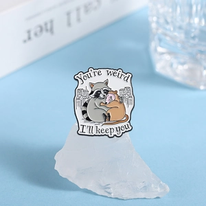 Cute enamel opossum and raccoon hug pin with You are weird I will keep you text