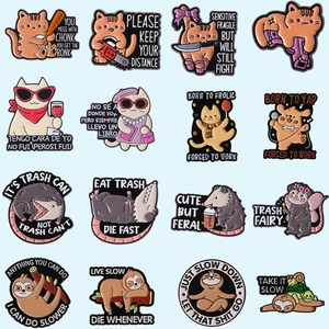 Detailed 4x4 matrix display of 16 funny cartoon animal enamel pins and badges