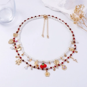 Double-layered pearl necklace with red glass beads and mixed alloy flower charms