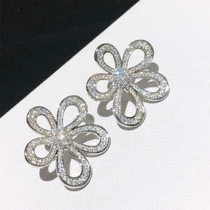 Elegant hollow sunflower stud earrings in silver finish with pavé set zircon crystals