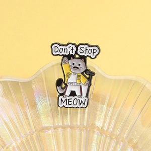 Cute cat enamel pin featuring Queen Freddie Mercury style and Don't Stop Meow text